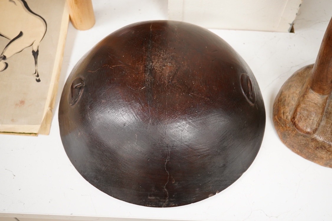 A Fijian carved wood Kava bowl and a West African Dogon fertility figure, 91cm tall